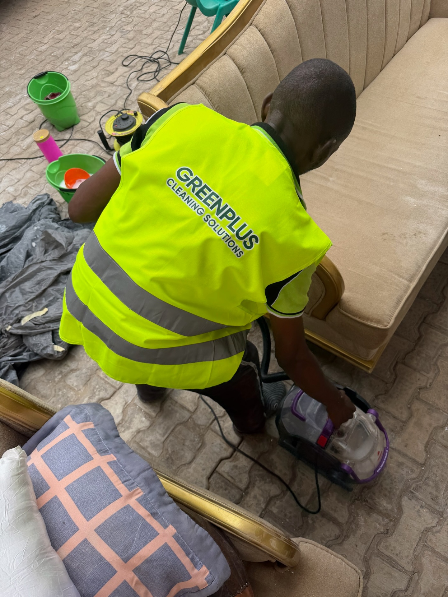 Sofa shampooing and stain treatment in progress